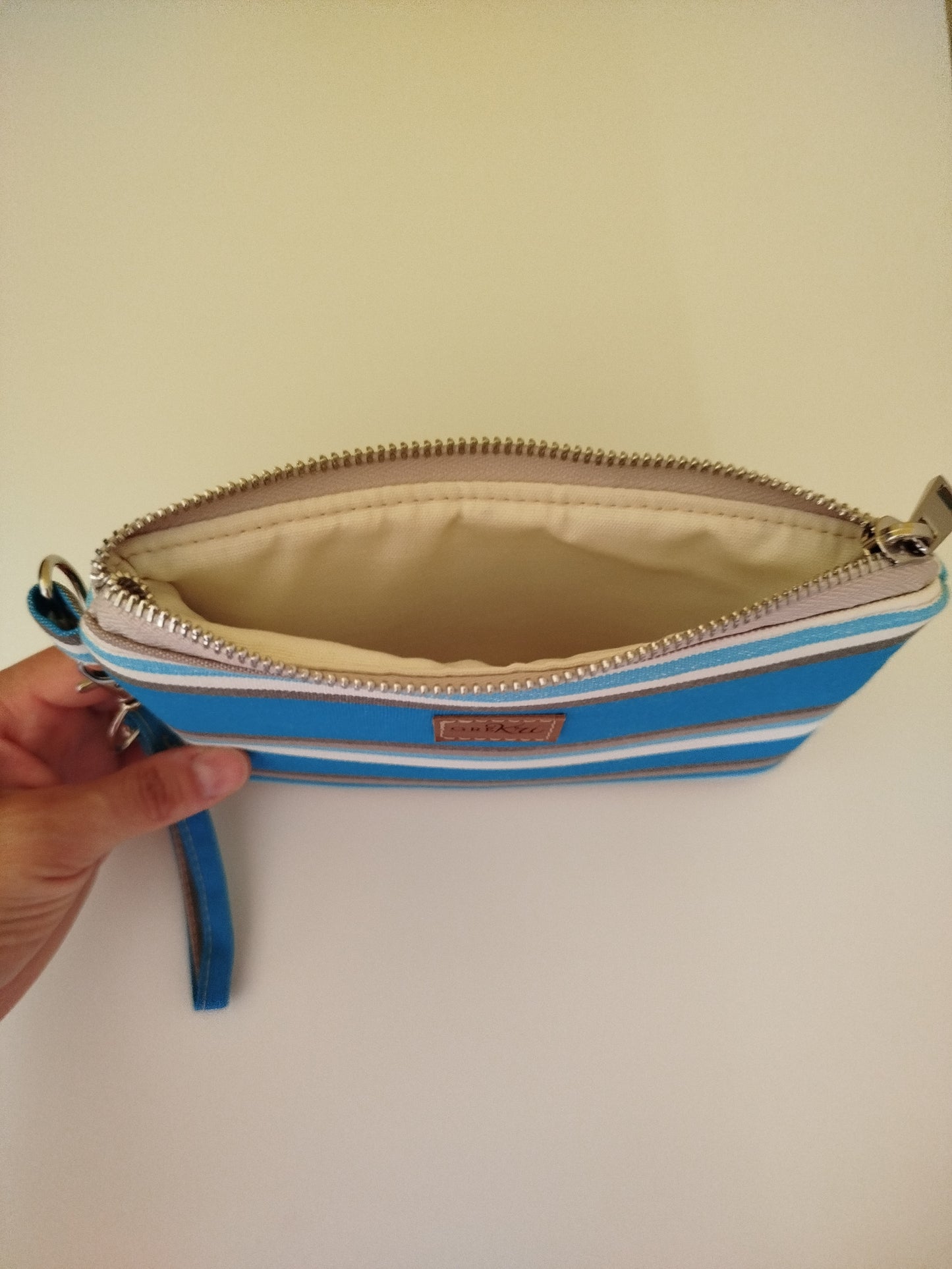 Mini pochette fantasia a righe