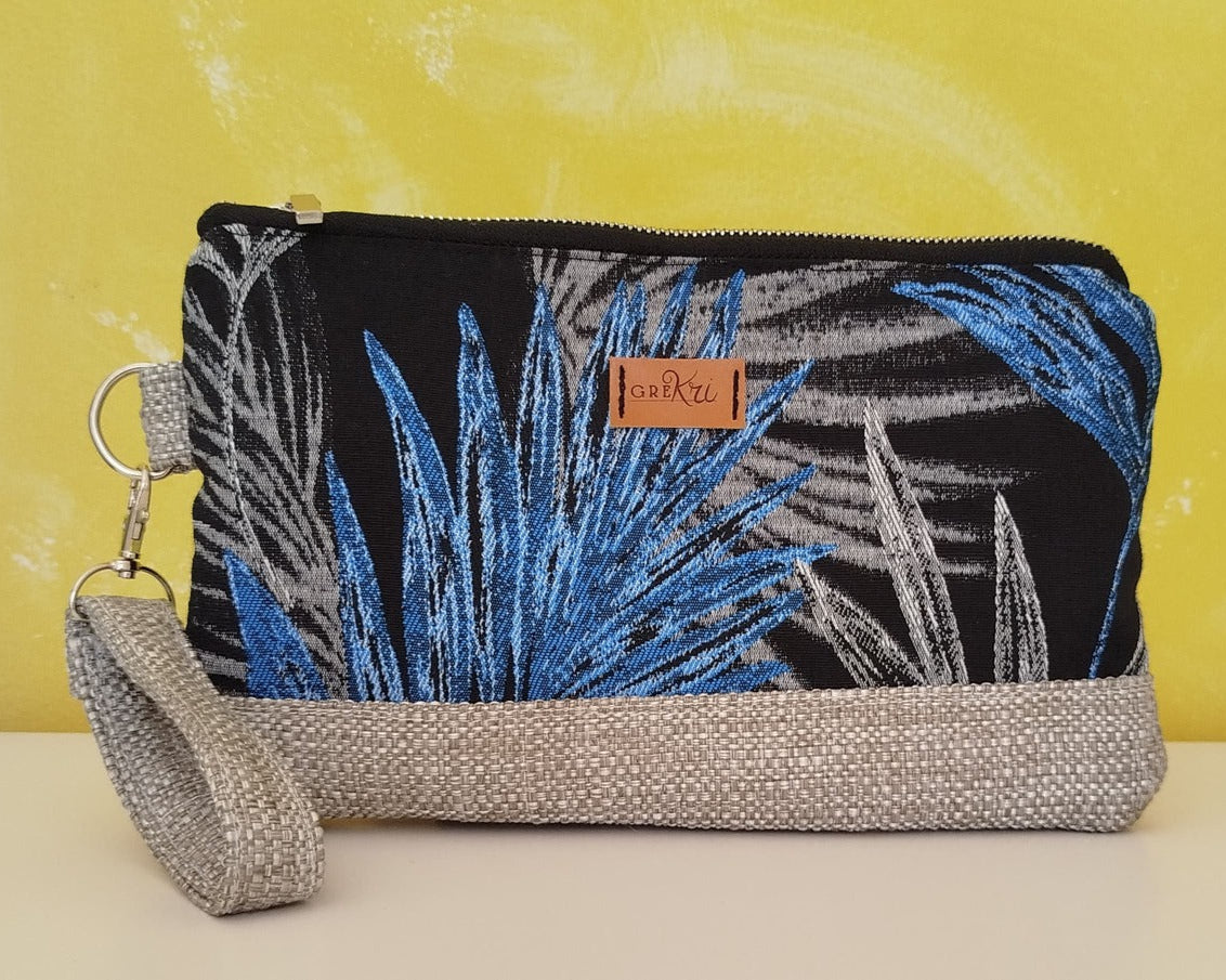 Pochette fantasia foglie tropical